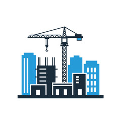 Obraz premium Construction crane and buildings with blue skyline