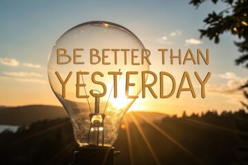 Light Bulb Silhouette Illuminates Inspirational Quote Over Sunrise