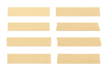 Beige adhesive masking tape pieces with torn edges, separate stickers for fixing elements, paper strips