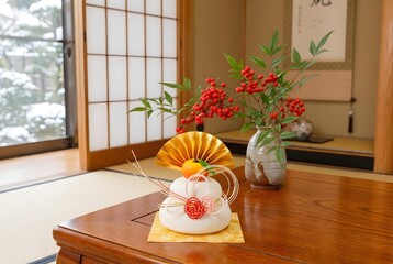 Traditional japanese new year's cake on wooden table isolated on white background