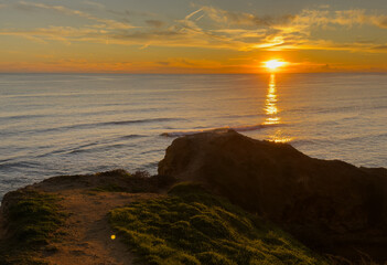 View of the sea and rocks of the beach of Olhos de Agua, Albufeira, Algarve, Portugal.