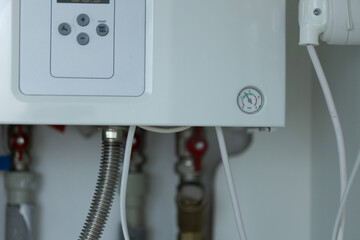 Heating gas boiler control panel with buttons. Symbolic image of the heating season at home.