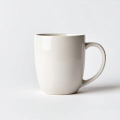 White ceramic mug with handle sitting on plain background evoking calm and minimal morning