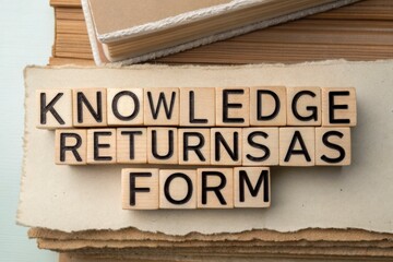 Wooden Letter Blocks Spell Knowledge Returns As Form On Stacked Paper