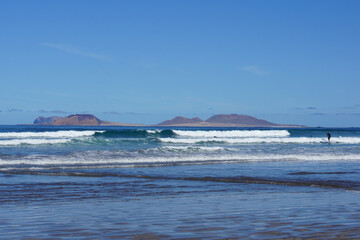 View on La Graciosa from Lanzarote, famara cliff, famara, lanzarote, canary islands, spain, November 2025, holiday, rocks, volcanic island, famara beach