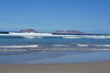 View on La Graciosa from Lanzarote, famara cliff, famara, lanzarote, canary islands, spain, November 2025, holiday, rocks, volcanic island, famara beach