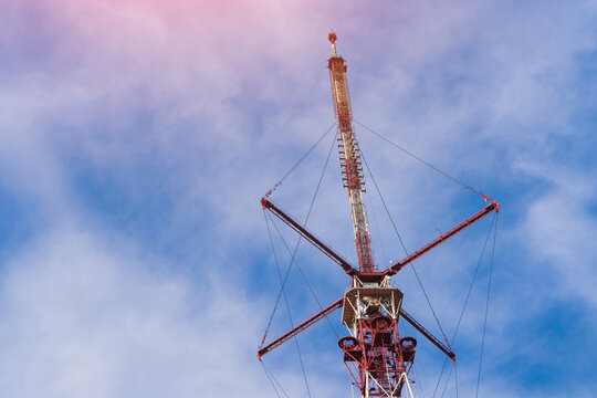 VHF television antenna on a blue sky background