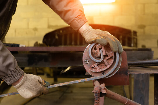 Forging and bending metal close-up