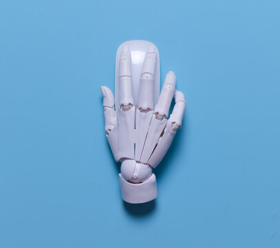 Future of Work: Robot Hand on Computer Mouse, Representing Office Technology and AI