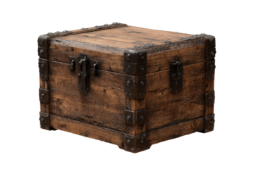 Wooden box with metal fastenings placed on a plain background during daylight hours