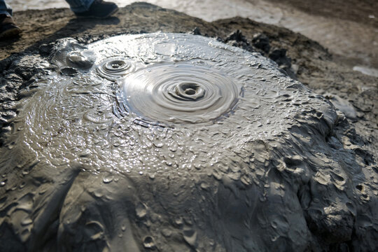 Mud volcanoes in Azerbaijan at Gobustan Nature Reserve near Baku. View of Mud volcano and landscape in Gobustan, Azerbaijan