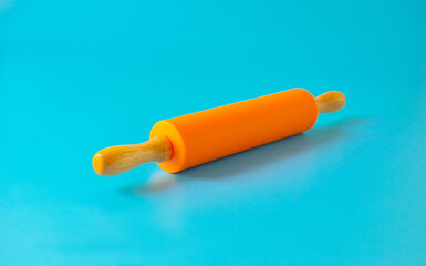 New plastic rolling pin isolated on white background.