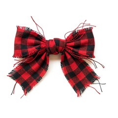 Rustic red and black buffalo plaid bow with frayed edges isolated on white background for Christmas decoration