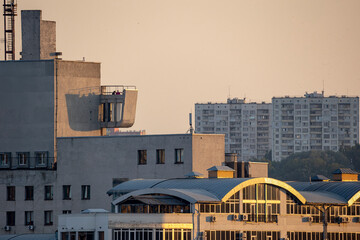 Architecture contrast of brutalist and modern buildings