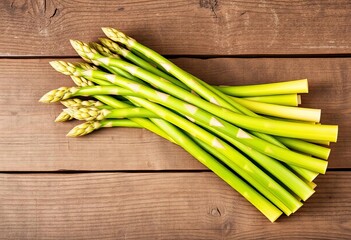 Fresh green asparagus spears, tightly bundled on a rustic wooden surface,  fresh, asparagus