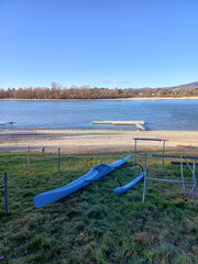 Abandoned Boat Resting On Winter Shore