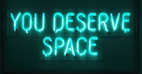 Obraz premium Bright turquoise neon sign displays positive message. Dark background emphasizes glowing text, simple design. Inspiring words promote selfcare.
