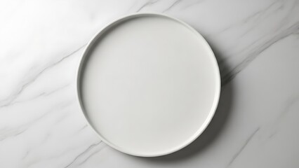 Empty white plate on marble surface