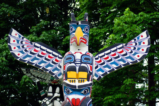 DUNCAN BC CANADA JUNE 22 2015: Totem pole in Duncan's tourism slogan is "The City of Totems". The city has 80 totem poles around the entire town, which were erected in the late 1980s.