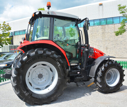 ROMONT CANADA JULY 17: Tractor 5450 Massey Ferguson Limited is a major agricultural equipment manufacturer which was based in Brantford, Ontario, Canada on july 17 2013 in Bromont,  Quebec, Canada