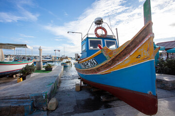 Marsaxlokk Harbour Malta with the traditional fishing boats.