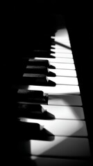 Naklejka premium piano. Close-up of black and white piano keys with a narrow beam of light creating shadows. event programs, museum guides, designed for cultural heritage projects and event programs. 