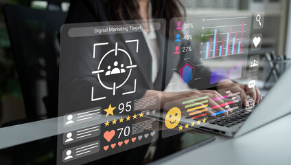 A business professional types on a laptop surrounded by digital marketing metrics, showcasing analytics and performance indicators for effective strategy planning. Gantry