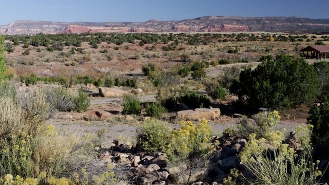 Long, beautiful view of the red rocks at Ghost Ranch from the Army Corps of Engineers&rsquo; Abiquiu Lake in northern New Mexico, USA