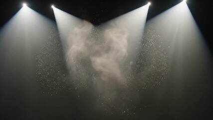 Spotlight illuminates dust particles in a dark, atmospheric theater setting, creating a dramatic and ethereal effect