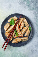 japanese fried dumplings, gyoza, sesame seeds, top view, no people,