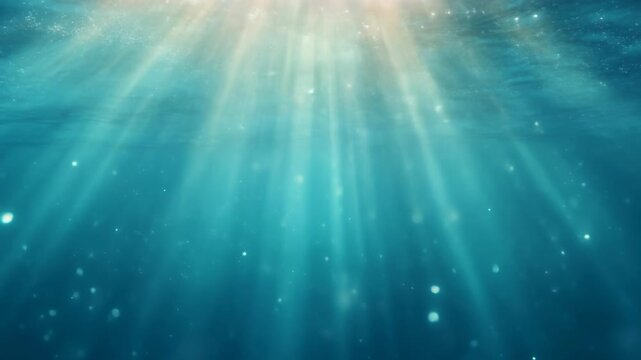 Sunlight beams shining through clear ocean water