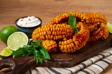 corn ribs, with cream sauce , spices and lime, appetizer, homemade, no people,