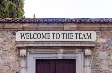 Support, help welcome to the team symbol. Concept words Welcome to the team on beautiful white marble sign plate. Beautiful stone wall background. Business welcome to the team concept. Copy space.