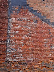 Brick wall with remnant markings