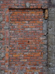Bricked in window in  brick wall