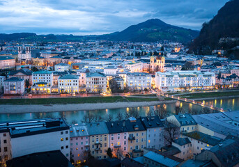 Obraz premium View of Salzburg city, Salzac River in an evening. Cityscape of Old City of Salzburg, birthplace of Mozart. Charming European City in Austria. 