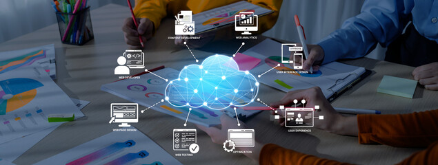 A group of professionals collaborates in a modern office with cloud technology, showcasing teamwork and innovative ideas through data analysis and communication. Trope