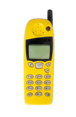 Old yellow mobile phone isolated