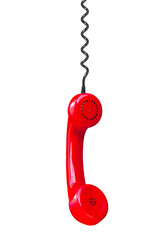 Red telephone handset hanging on cable