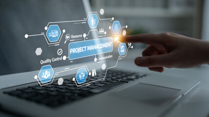 A dynamic project management display is presented on a laptop, showcasing interactive elements and digital tools, symbolizing innovation and business strategy in action. Tessel