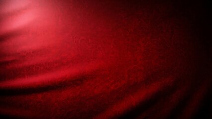 Vibrant red fabric with elegant patterns and soft folds