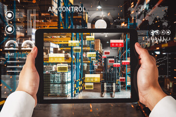 Smart warehouse management system using augmented reality technology to identify package picking and delivery . Future concept of supply chain and logistic business .