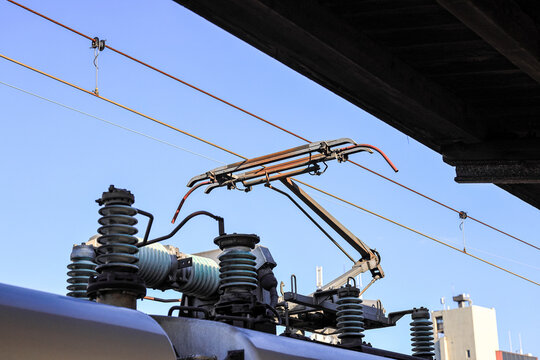 Pantograph of an electric train connecting the train to the overhead catenary wire.	