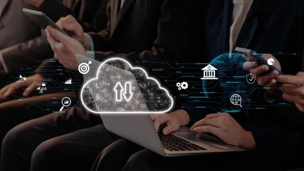 A diverse group of business professionals actively using digital devices in an office setting, surrounded by cloud computing visuals and networking graphics. Raster - Powered by Adobe