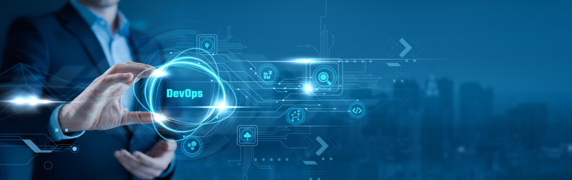 Businessman holding a DevOps in his hand continuous integration, software deployment, agile development, automation tools, IT collaboration, cloud operations