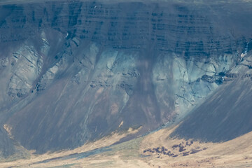 Layered Mountain Cliff and Erosion Patterns in Iceland