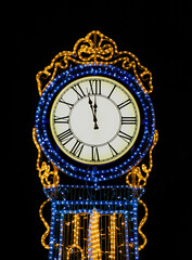 Christmas celebration. Vintage outdoor clock 