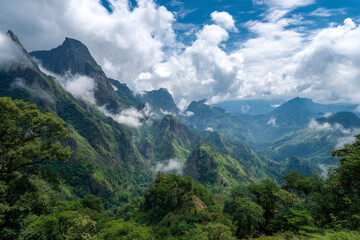 Fototapeta premium The dramatic, lush peaks of the Sierra Madre de Chiapas, showing cloud forests and coffee plantations under a vast sky.