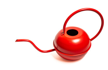 An elegantly designed red metal watering can, isolated against a white background 