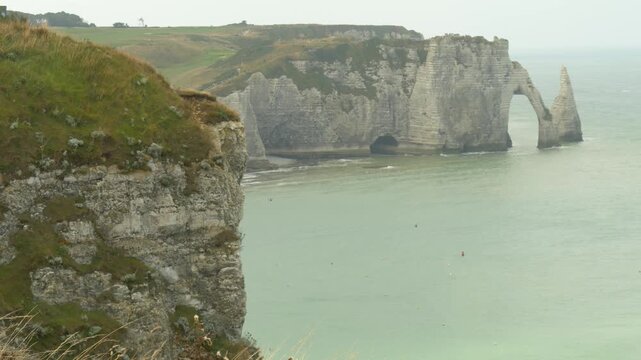 Scenic landscape of Etretat cliffs and natural arch Normandy France